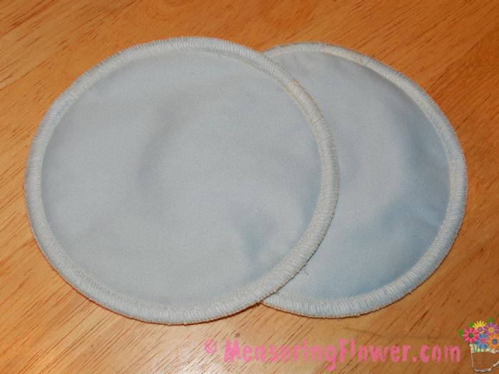 The overnight nursing pads are round and have more layers for extra absorbency.